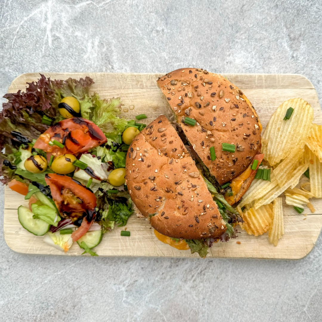 Tuna Melt Sandwich Tuna Melt Sandwich with side salad and crisps